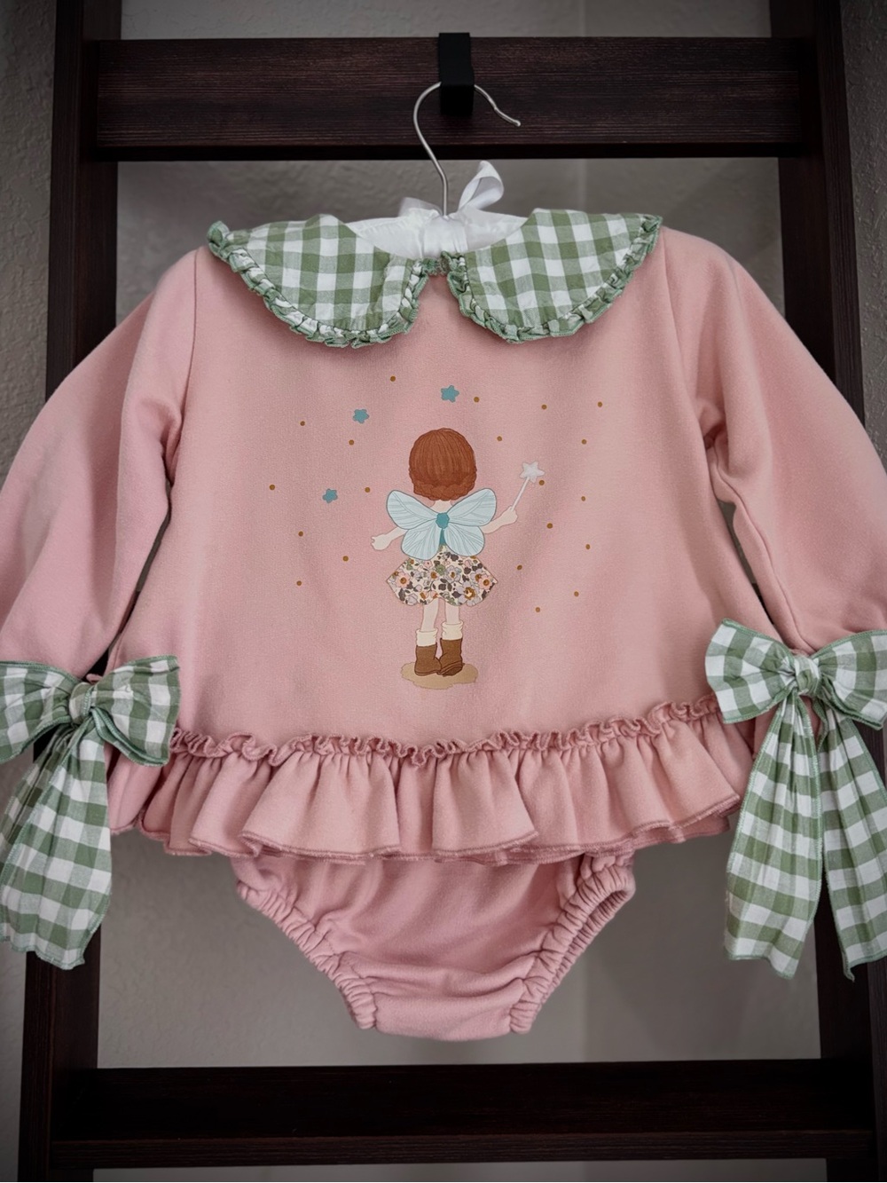 Sets with a sweatshirt and a diaper cover.